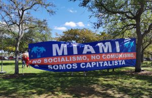 A banner at the FRWND Republican Unity Picnic states, “Miami. No socialism. No communism. We are Capitalists.” (Zoe Chin/SFMN)